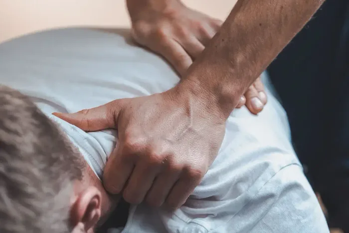 Hands-on spinal treatment session